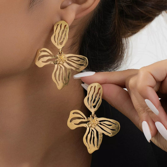 gold butterfly statement earrings bold style