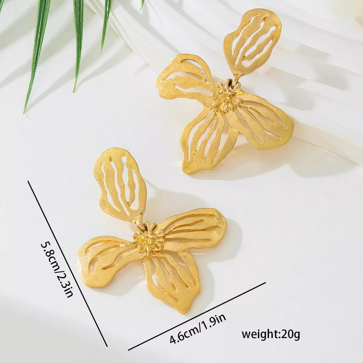 fashion statement earrings gold butterfly design
